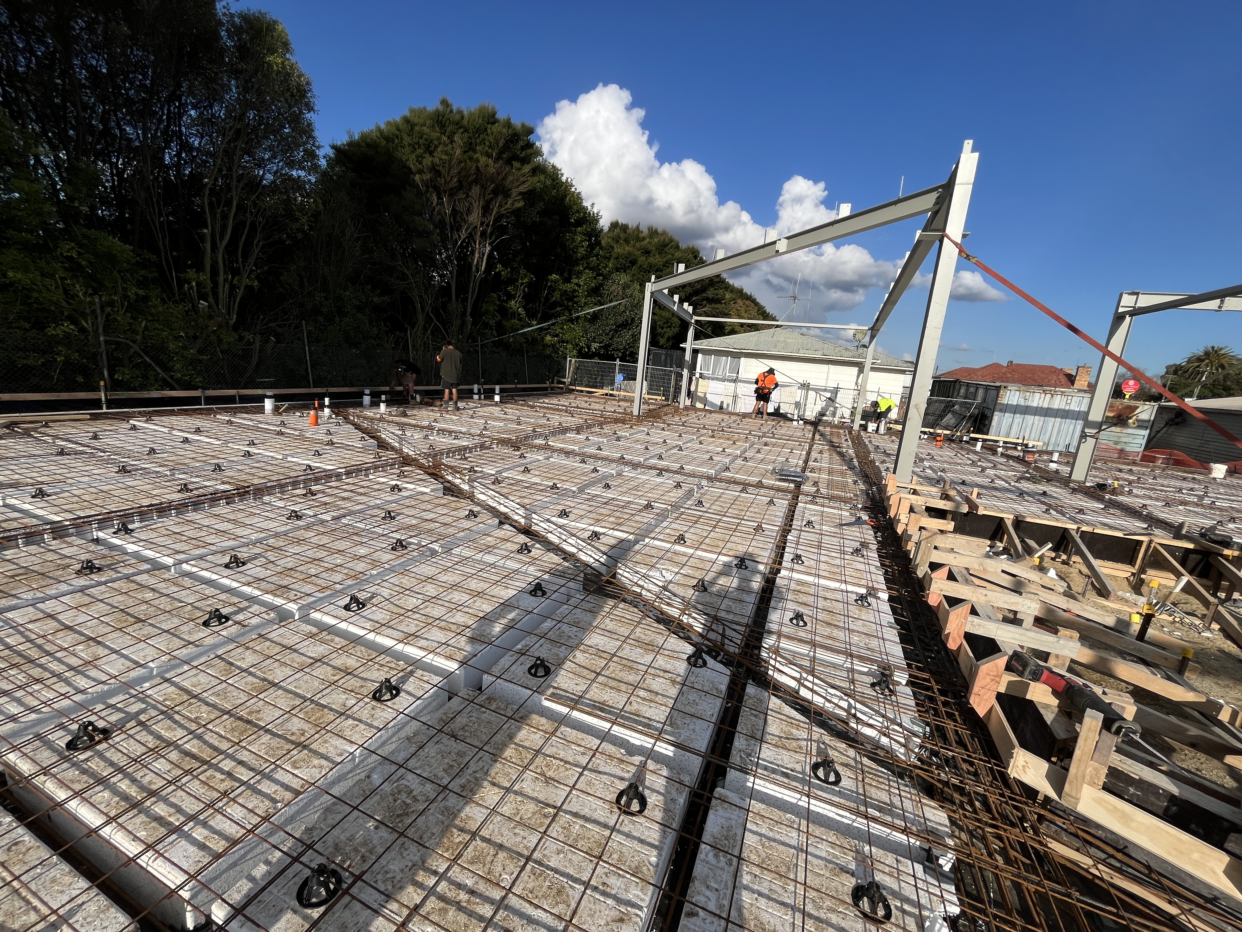 Slab preparation and structural steel framing at Ora Business Park